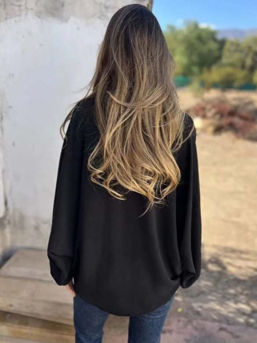 Blusa larga con botones