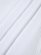 Top de canalé con aberturas